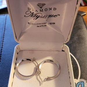 Diamond Mystique Platinum Over Silver Earrings.